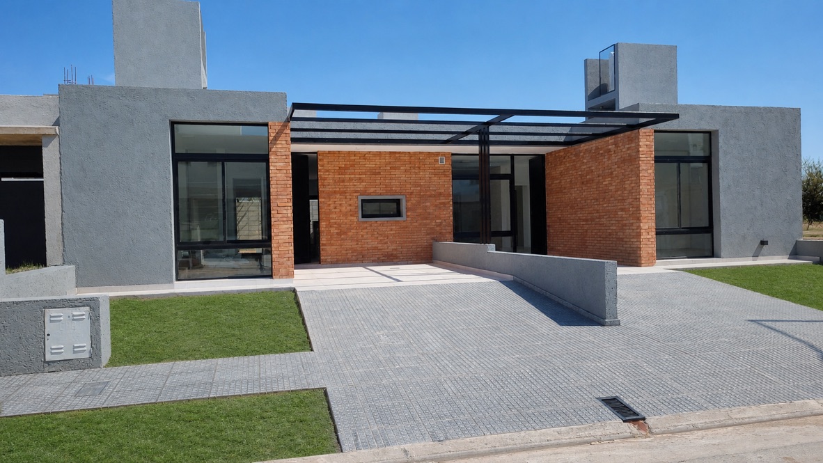 Frente de una vivienda de CALA Prados I